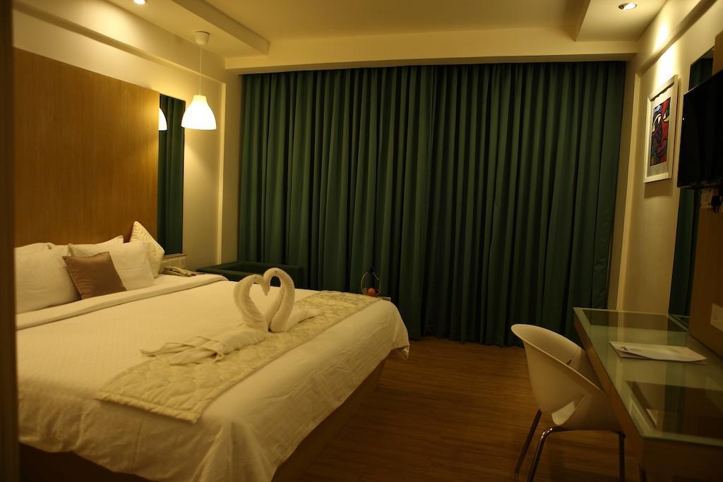 Ginger Kochi Mg Road Hotel Room photo